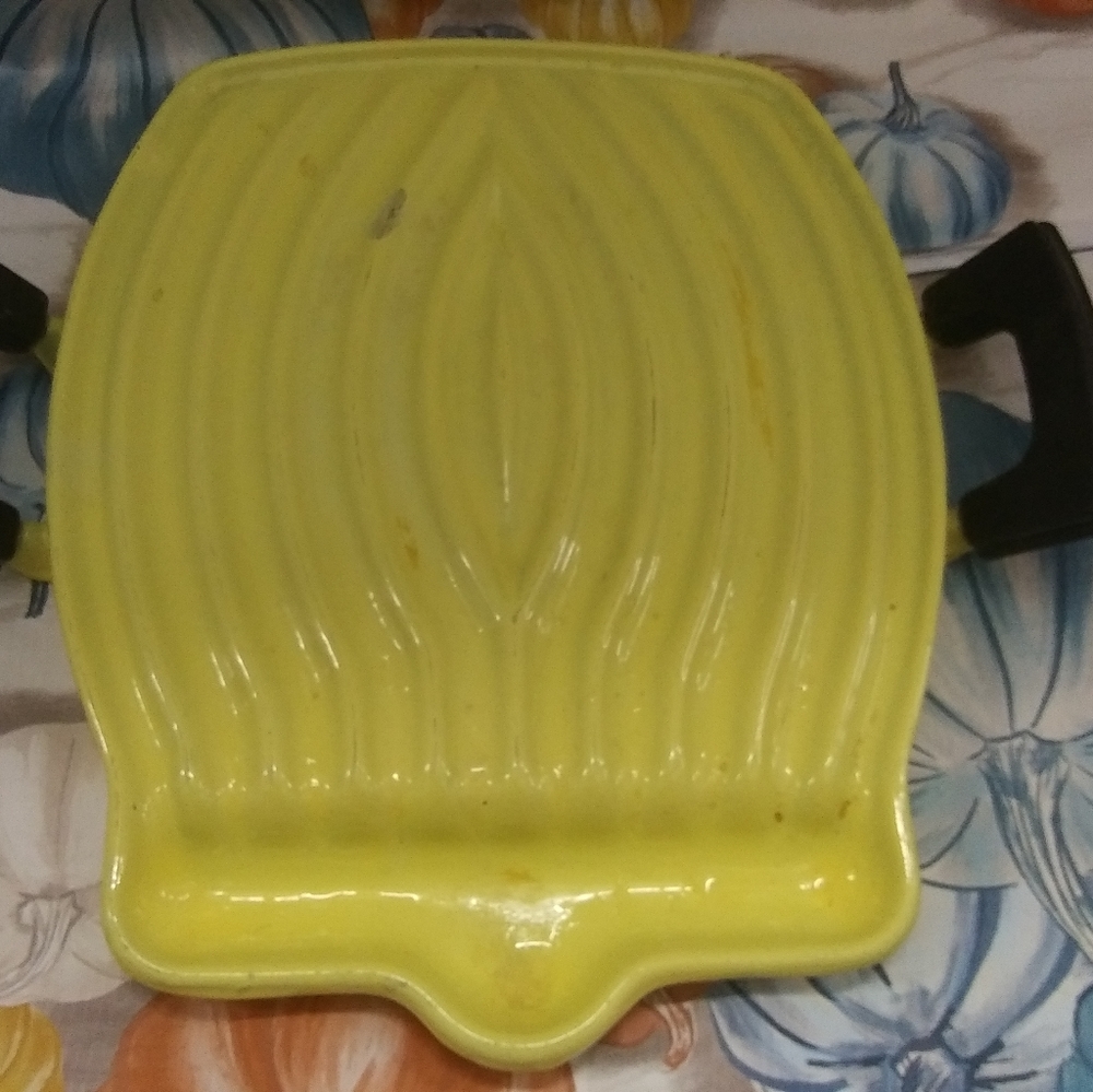 Large Vtg. Yellow. Cast Iron Trivet